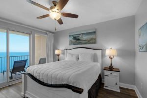 A bedroom at a Thomas Drive condo in Panama City Beach to watch the sunset from.