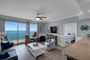 The living room at a Panama City Beach rental to relax in after exploring the best hiking trails in this Florida town.